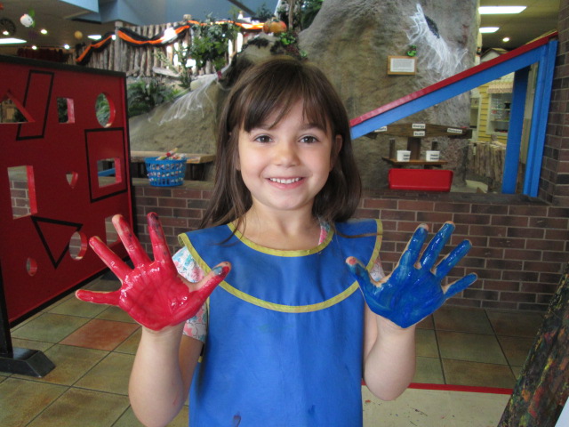 Girl with painted hands.JPG